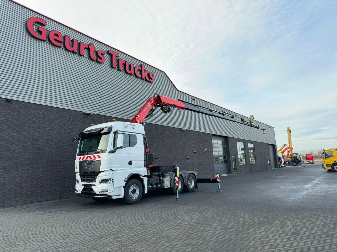 MAN TGX 33.520 6X4 TREKKER-BAKWAGEN COMBI + FASSI F4 - Truk derek: gambar 2 MAN TGX 33.520 6X4 TREKKER-BAKWAGEN COMBI + FASSI F4 - Truk derek: gambar 2
