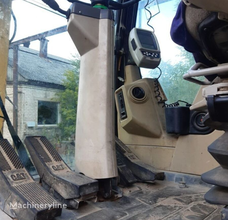 Caterpillar M313C - Ekskavator roda: gambar 1 Caterpillar M313C - Ekskavator roda: gambar 1