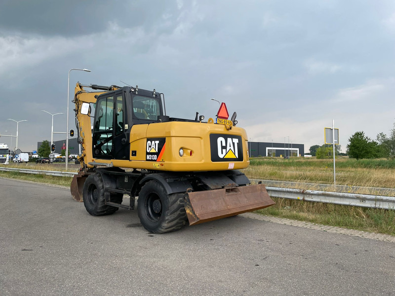 Caterpillar M313D - CE - Ekskavator roda: gambar 2 Caterpillar M313D - CE - Ekskavator roda: gambar 2