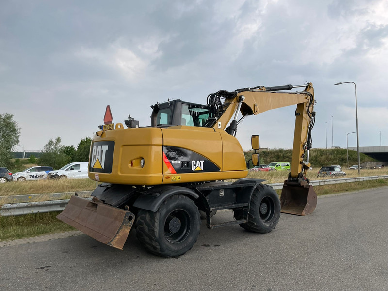 Caterpillar M313D - CE - Ekskavator roda: gambar 5 Caterpillar M313D - CE - Ekskavator roda: gambar 5