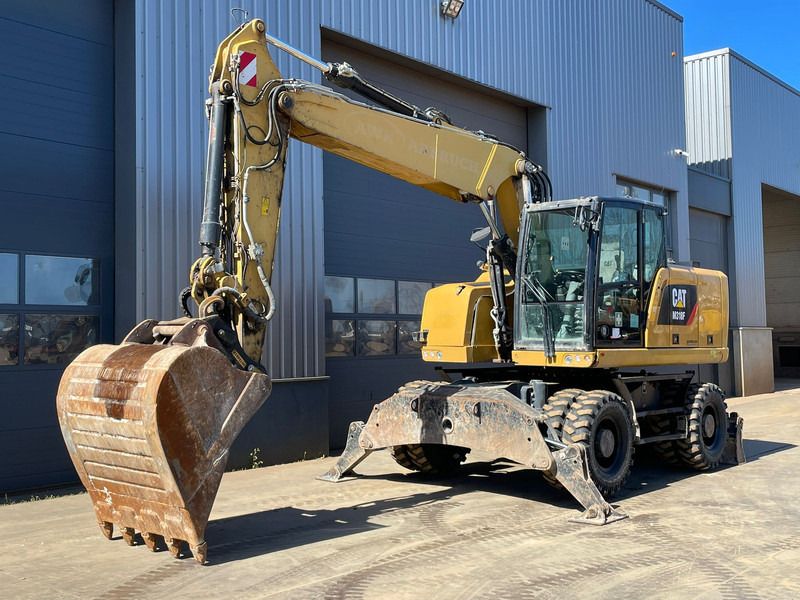 Caterpillar M318F - Ekskavator roda: gambar 2 Caterpillar M318F - Ekskavator roda: gambar 2