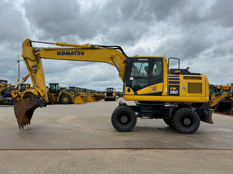 Komatsu PW180-11 - Ekskavator roda: gambar 1 Komatsu PW180-11 - Ekskavator roda: gambar 1