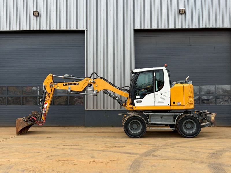 Ekskavator roda Liebherr 910: gambar 14