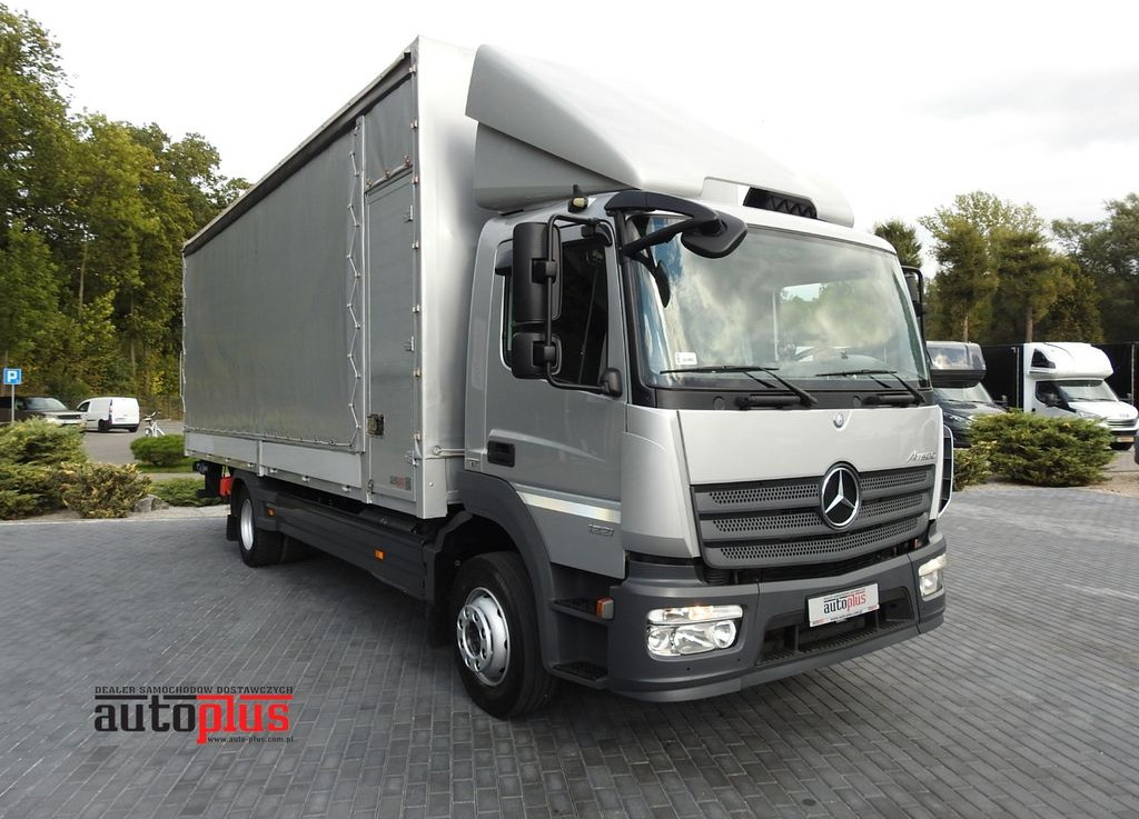 Mercedes-Benz ATEGO 1221 PRITSCHE PLANE AUFZUG 16 PALETTEN - Truk dengan terpal samping: gambar 1 Mercedes-Benz ATEGO 1221 PRITSCHE PLANE AUFZUG 16 PALETTEN - Truk dengan terpal samping: gambar 1
