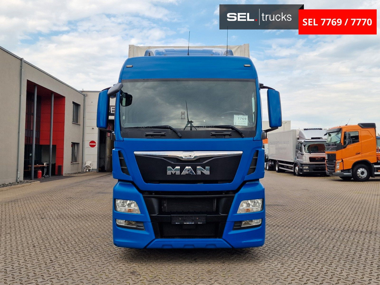 MAN TGX 18.440 4X2 LL-U/ Intarder/ Hubdach/Durchlade - Truk dengan terpal samping: gambar 2 MAN TGX 18.440 4X2 LL-U/ Intarder/ Hubdach/Durchlade - Truk dengan terpal samping: gambar 2