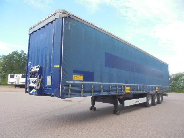 Krone SD NL KENTEKEN BPW TROMMEL ASSEN 35 IN STOCK - Semi-trailer dengan terpal samping: gambar 1 Krone SD NL KENTEKEN BPW TROMMEL ASSEN 35 IN STOCK - Semi-trailer dengan terpal samping: gambar 1
