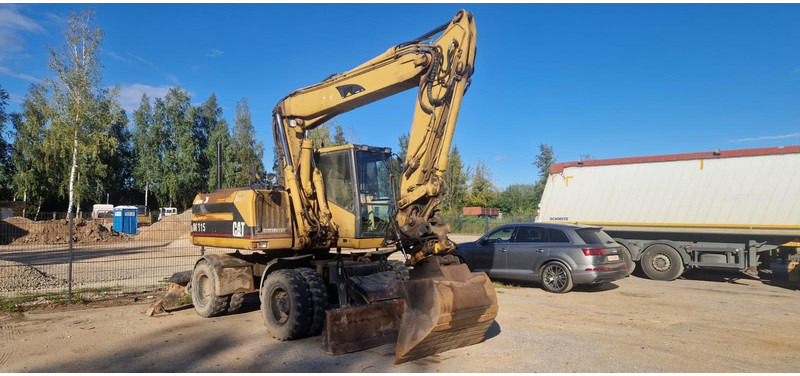 Caterpillar M 315 Rototilt - Ekskavator roda: gambar 1 Caterpillar M 315 Rototilt - Ekskavator roda: gambar 1