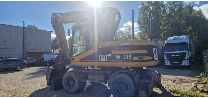 Caterpillar M 315 Rototilt - Ekskavator roda: gambar 3 Caterpillar M 315 Rototilt - Ekskavator roda: gambar 3