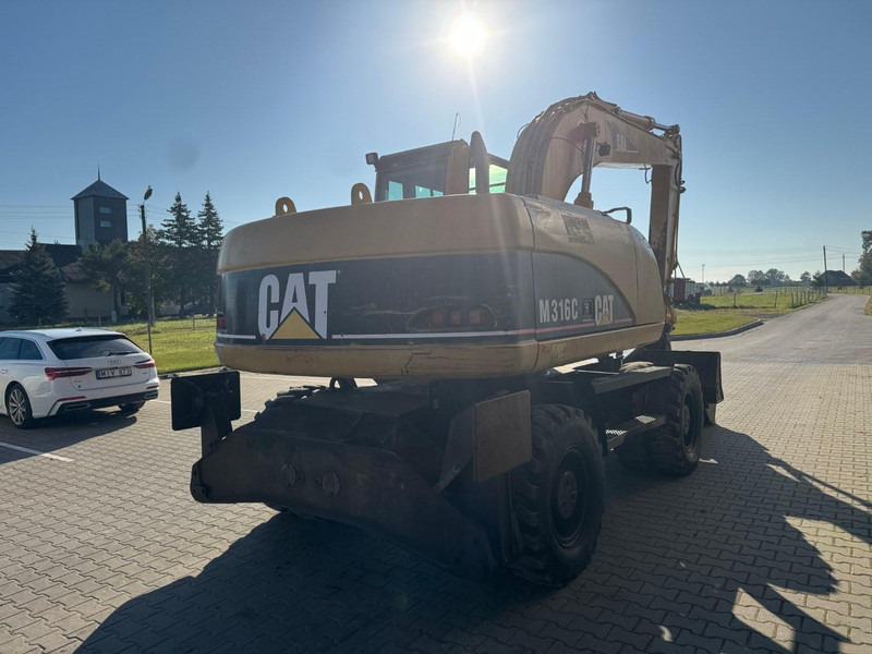 Caterpillar M 316 C - Ekskavator roda: gambar 3 Caterpillar M 316 C - Ekskavator roda: gambar 3