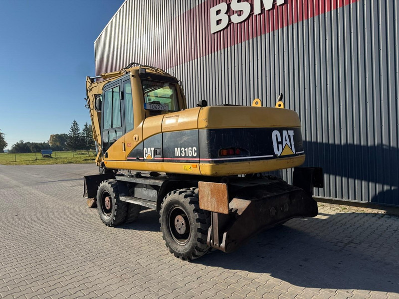 Caterpillar M 316 C - Ekskavator roda: gambar 4 Caterpillar M 316 C - Ekskavator roda: gambar 4