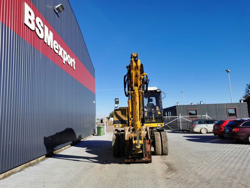 Caterpillar M315 wheel excavator - Ekskavator roda: gambar 3 Caterpillar M315 wheel excavator - Ekskavator roda: gambar 3
