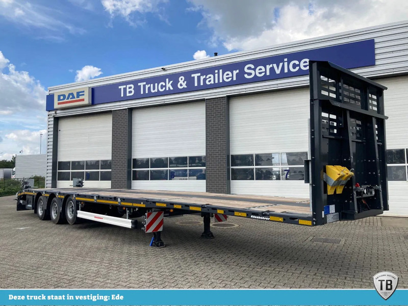Kässbohrer SPS HM 3 / 0N - 18 / 27 Vlakke mega trailer met liftas, 18x rongen en kist voor de oprijplaten - Semi-trailer flatbed: gambar 1 Kässbohrer SPS HM 3 / 0N - 18 / 27 Vlakke mega trailer met liftas, 18x rongen en kist voor de oprijplaten - Semi-trailer flatbed: gambar 1