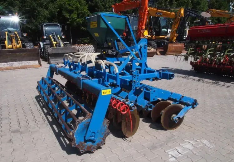 Agregat uprawowo-siewny Rabe Werk 2011 3m brona talerzowa z siewnikiem do poplonów - Menggabungkan bor benih: gambar 5 Agregat uprawowo-siewny Rabe Werk 2011 3m brona talerzowa z siewnikiem do poplonów - Menggabungkan bor benih: gambar 5