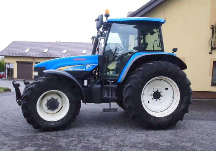 Ciągnik New Holland TM 140 2004 Przedni TUZ - Traktor: gambar 5 Ciągnik New Holland TM 140 2004 Przedni TUZ - Traktor: gambar 5
