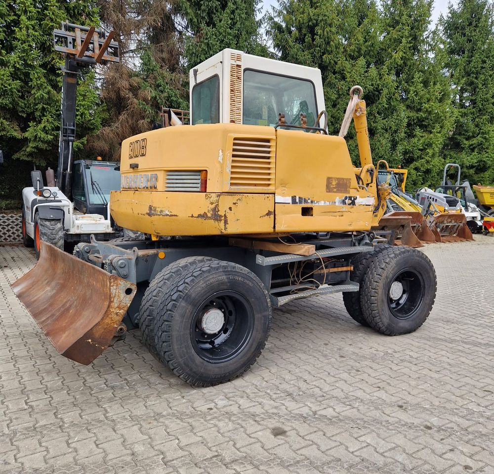 Pozostałe części Liebherr Liebherr A308 1999 Koparka kołowa Liebherr 308 - Ekskavator: gambar 1 Pozostałe części Liebherr Liebherr A308 1999 Koparka kołowa Liebherr 308 - Ekskavator: gambar 1