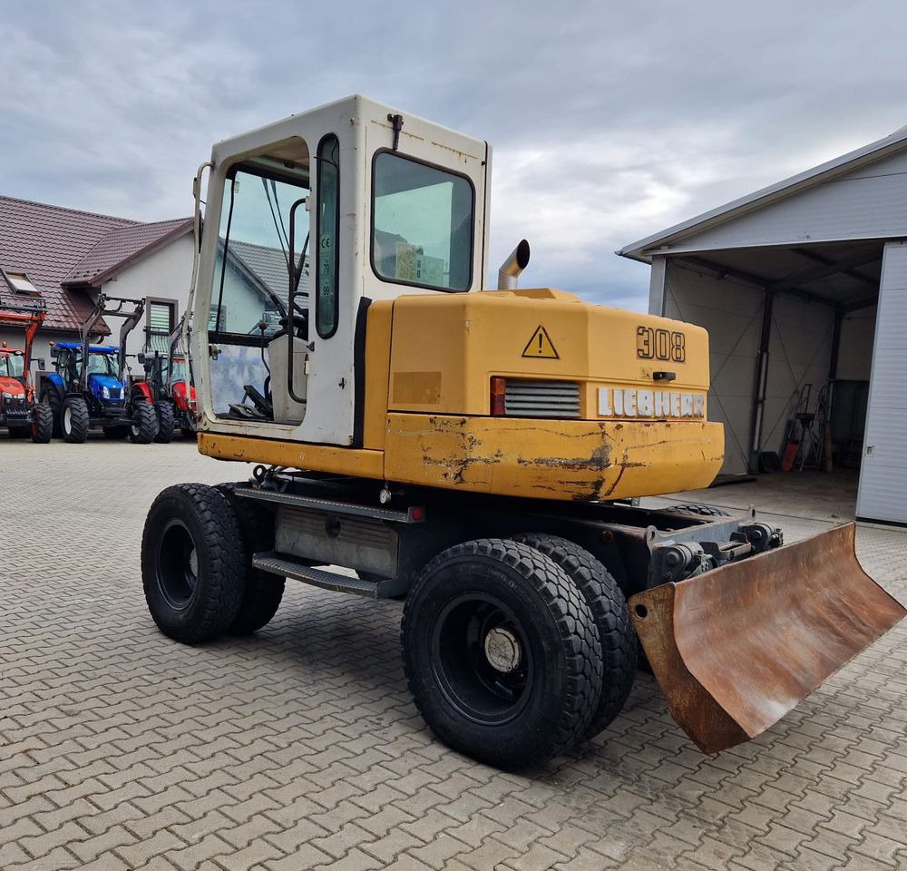 Pozostałe części Liebherr Liebherr A308 1999 Koparka kołowa Liebherr 308 - Ekskavator: gambar 4 Pozostałe części Liebherr Liebherr A308 1999 Koparka kołowa Liebherr 308 - Ekskavator: gambar 4