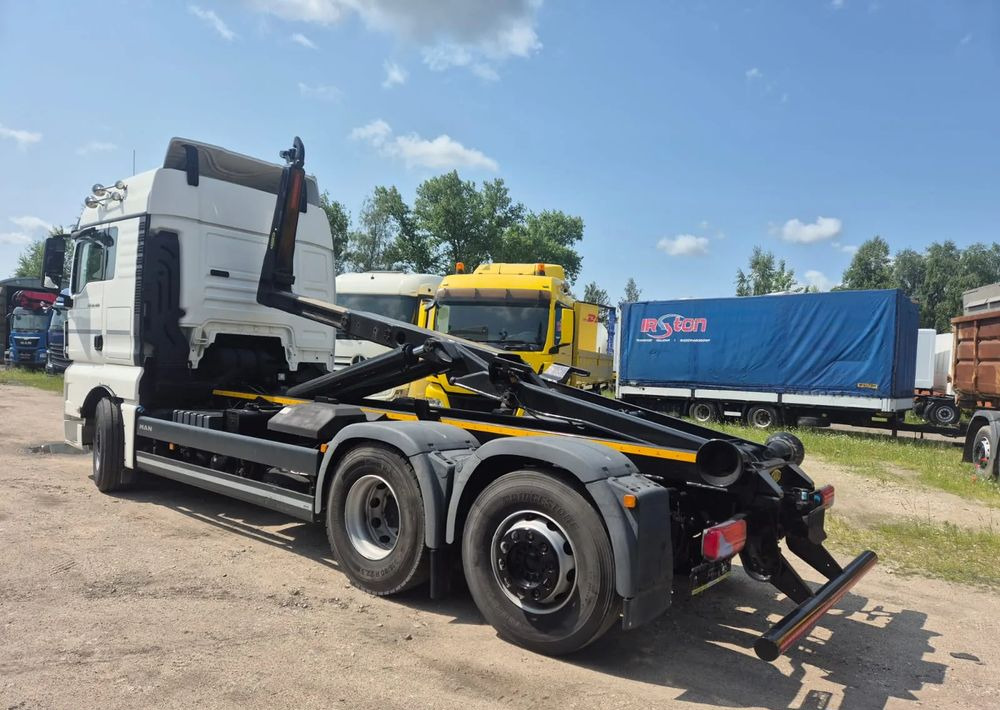 MAN TGX 26-460 Hakowiec oś skrętna - Hook lift: gambar 1 MAN TGX 26-460 Hakowiec oś skrętna - Hook lift: gambar 1