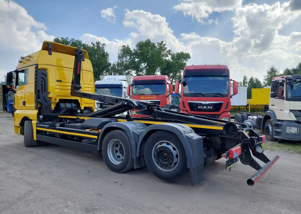 MAN TGX 26-500 Hakowiec oś skrętna - Hook lift: gambar 1 MAN TGX 26-500 Hakowiec oś skrętna - Hook lift: gambar 1