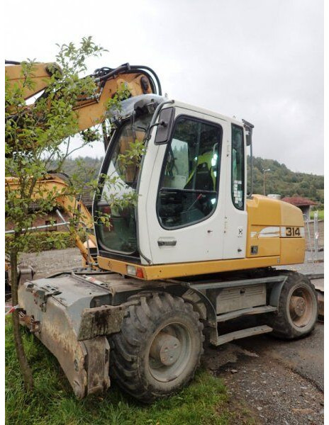 Liebherr A 314 - Ekskavator roda: gambar 1 Liebherr A 314 - Ekskavator roda: gambar 1