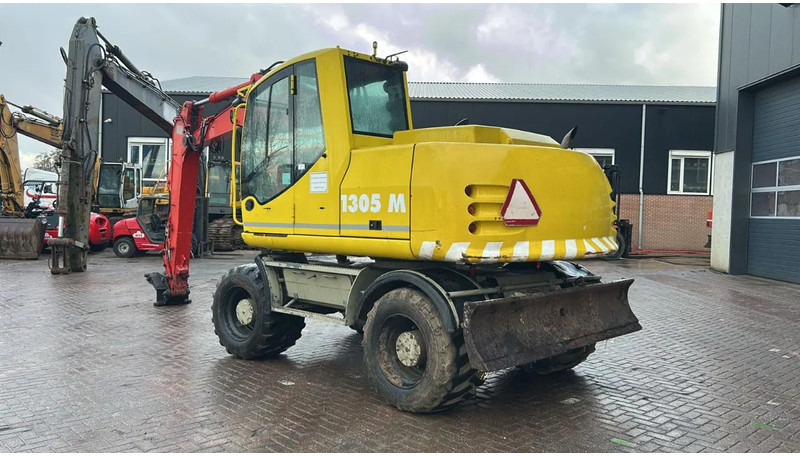 Atlas 1305 - Ekskavator roda: gambar 4 Atlas 1305 - Ekskavator roda: gambar 4