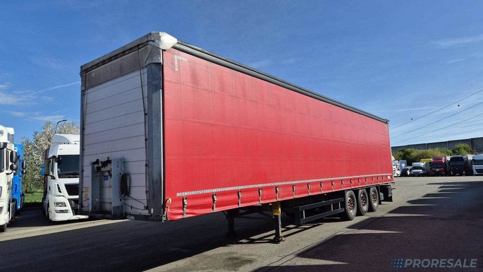 SCHMITZ CARGOBULL SCS 24/L - 13.62 EB Std. - Semi-trailer dengan terpal samping: gambar 2 SCHMITZ CARGOBULL SCS 24/L - 13.62 EB Std. - Semi-trailer dengan terpal samping: gambar 2