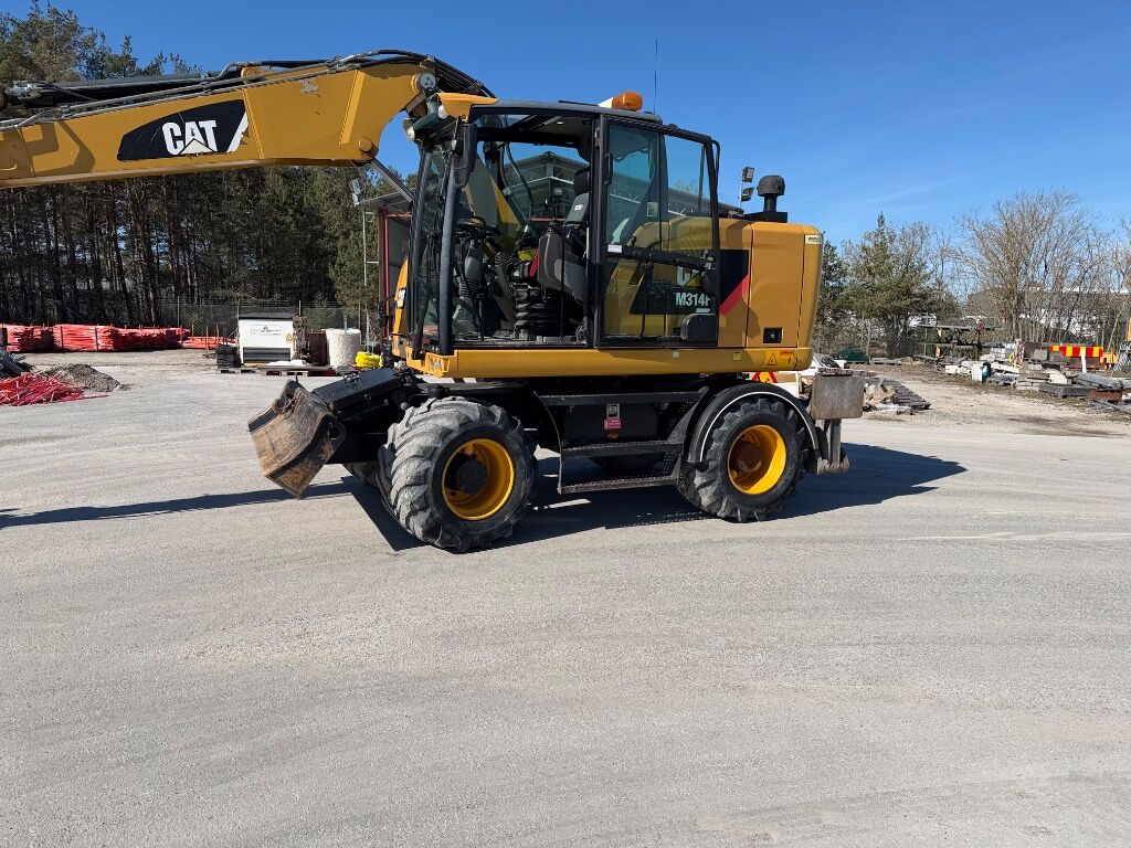 Grävmaskin CAT 314 F - Ekskavator roda: gambar 2 Grävmaskin CAT 314 F - Ekskavator roda: gambar 2
