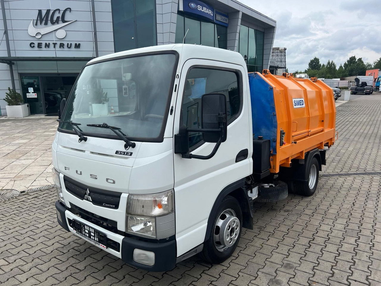 Mitsubishi Canter Fuso 3S13 AMT / Presscontainer / LOW KM / Super Condition - Truk sampah: gambar 1 Mitsubishi Canter Fuso 3S13 AMT / Presscontainer / LOW KM / Super Condition - Truk sampah: gambar 1