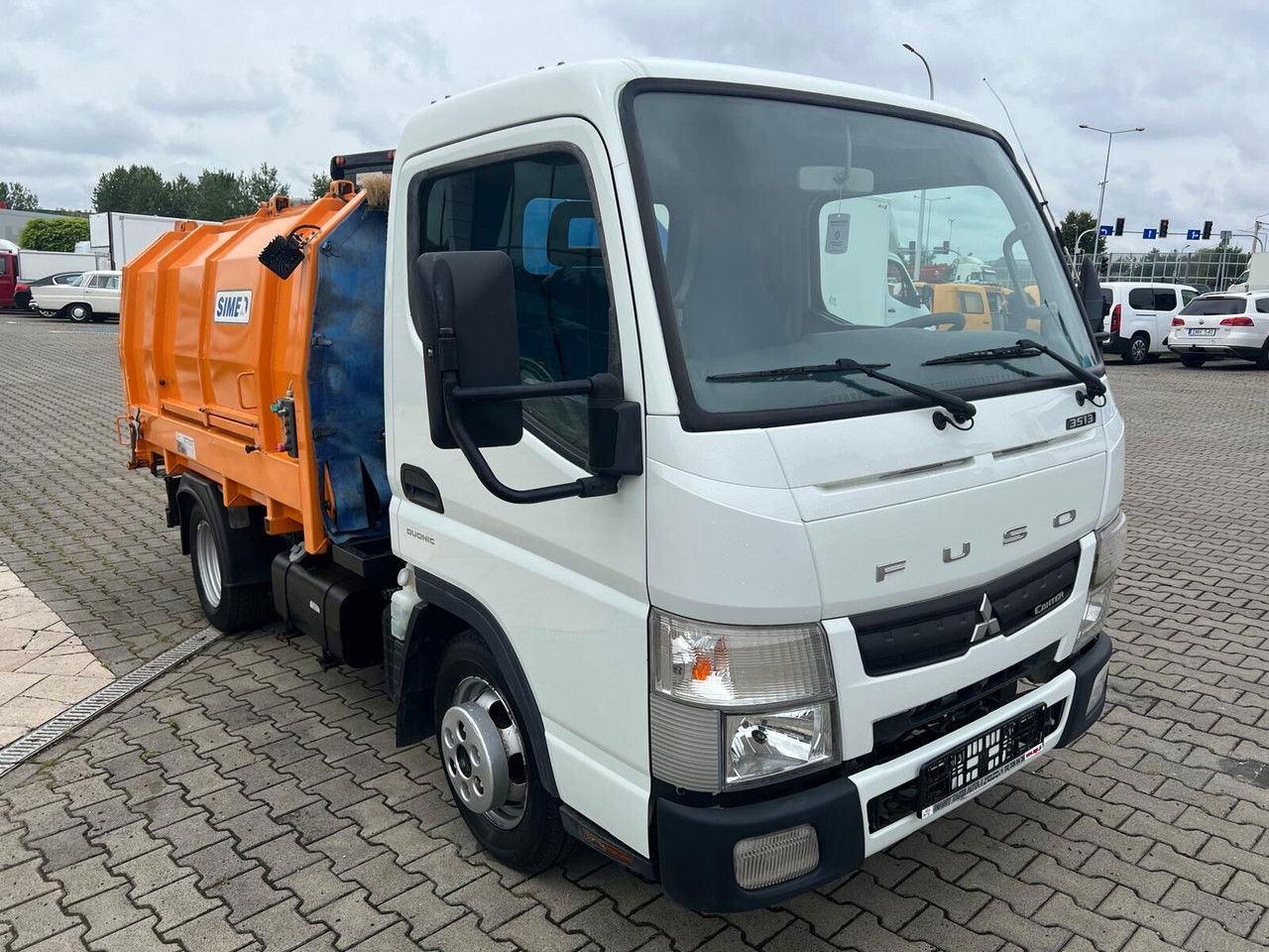 Mitsubishi Canter Fuso 3S13 AMT / Presscontainer / LOW KM / Super Condition - Truk sampah: gambar 2 Mitsubishi Canter Fuso 3S13 AMT / Presscontainer / LOW KM / Super Condition - Truk sampah: gambar 2
