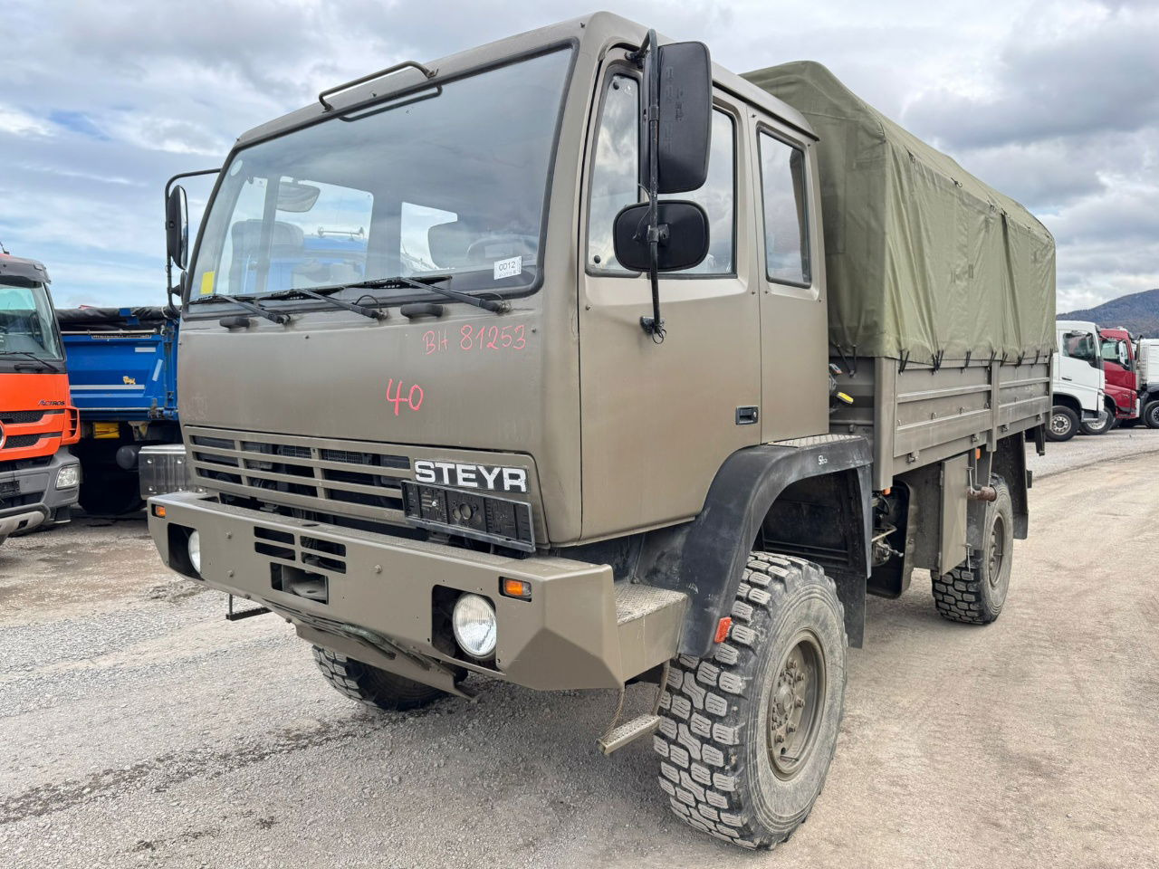 Steyr 12M18 4X4 stake body - truck - Truk dengan terpal samping: gambar 1 Steyr 12M18 4X4 stake body - truck - Truk dengan terpal samping: gambar 1