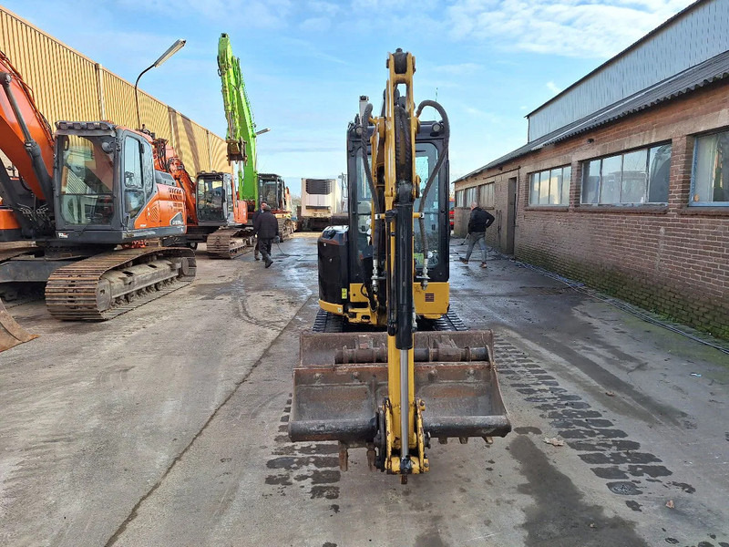 Caterpillar 303 - Ekskavator mini: gambar 2 Caterpillar 303 - Ekskavator mini: gambar 2