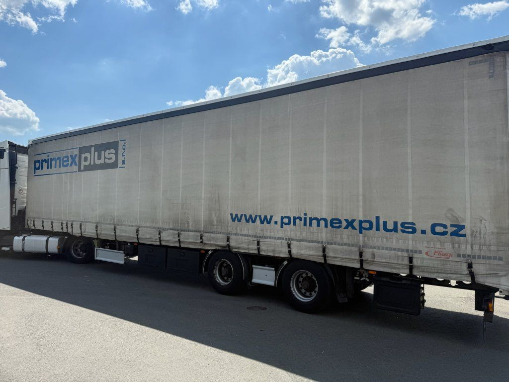 Fliegl MEGA/lowdeck 2xAchsen - Semi-trailer dengan terpal samping: gambar 5 Fliegl MEGA/lowdeck 2xAchsen - Semi-trailer dengan terpal samping: gambar 5