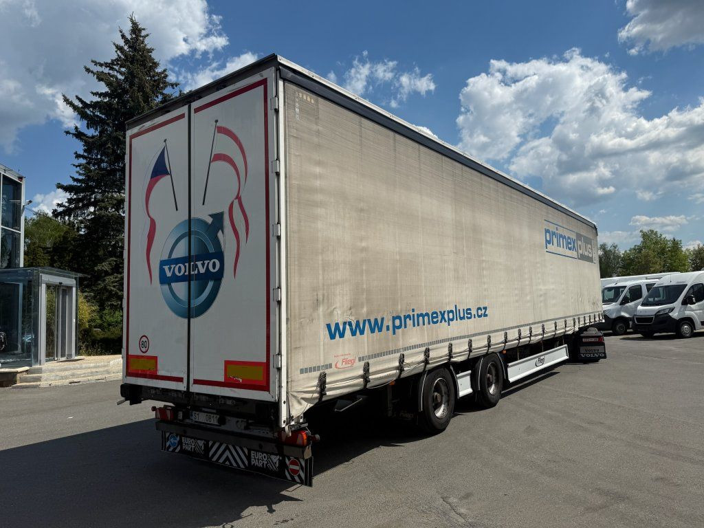 Fliegl MEGA/lowdeck 2xAchsen - Semi-trailer dengan terpal samping: gambar 3 Fliegl MEGA/lowdeck 2xAchsen - Semi-trailer dengan terpal samping: gambar 3