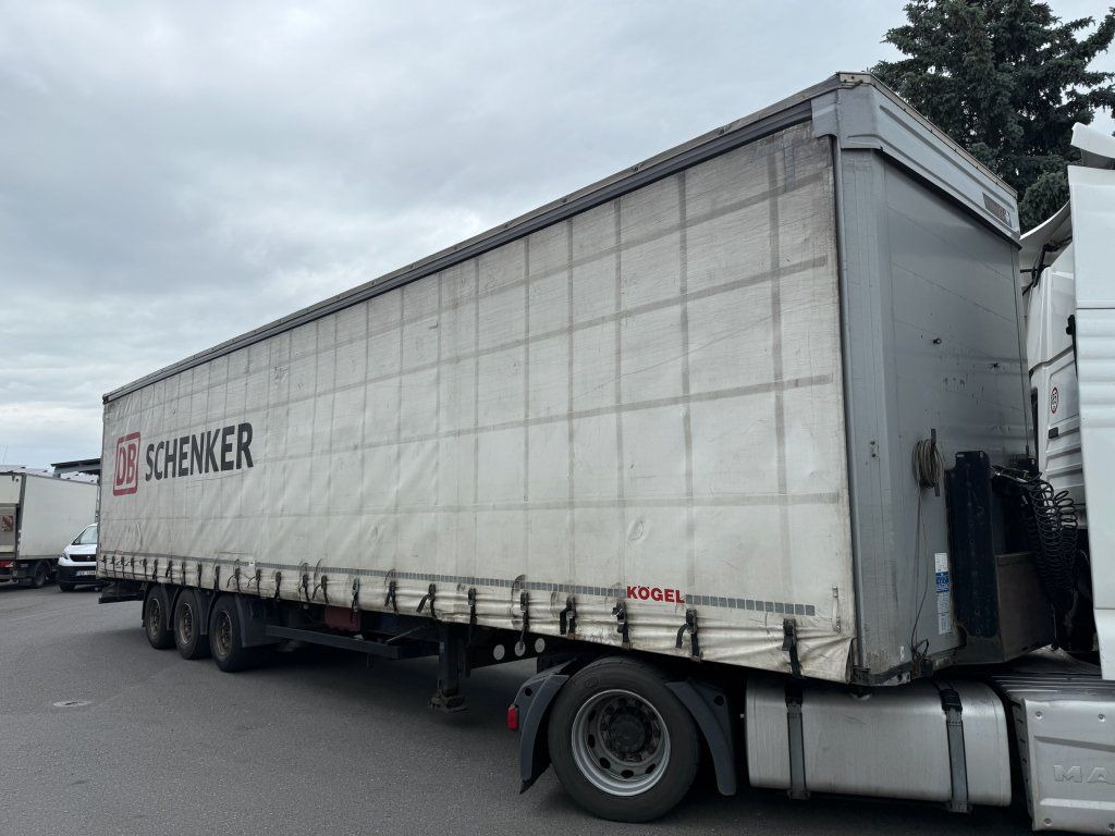Kögel S24-1 MEGA/lowdeck - Semi-trailer dengan terpal samping: gambar 1 Kögel S24-1 MEGA/lowdeck - Semi-trailer dengan terpal samping: gambar 1