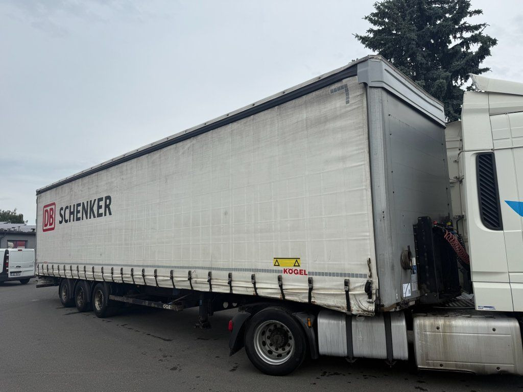 Kögel S24-1 MEGA/lowdeck - Semi-trailer dengan terpal samping: gambar 1 Kögel S24-1 MEGA/lowdeck - Semi-trailer dengan terpal samping: gambar 1