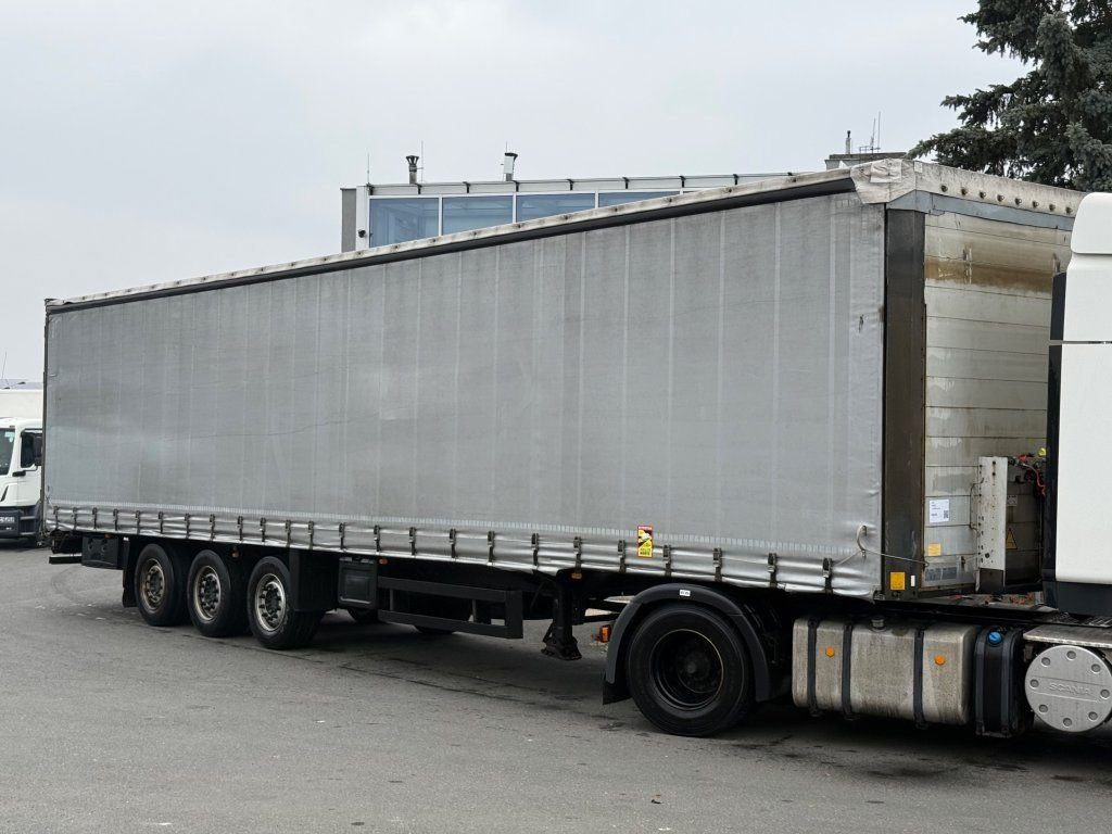 Schmitz Cargobull SCS24 - Semi-trailer dengan terpal samping: gambar 1 Schmitz Cargobull SCS24 - Semi-trailer dengan terpal samping: gambar 1