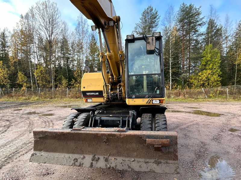 Caterpillar M312 Engcon EC20 tiltrotator - Ekskavator roda: gambar 3 Caterpillar M312 Engcon EC20 tiltrotator - Ekskavator roda: gambar 3