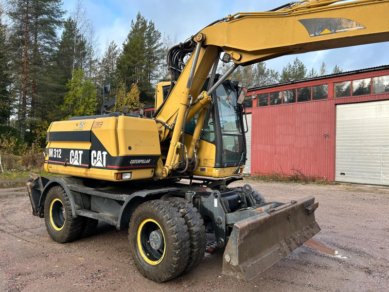 Caterpillar M312 Engcon EC20 tiltrotator - Ekskavator roda: gambar 4 Caterpillar M312 Engcon EC20 tiltrotator - Ekskavator roda: gambar 4