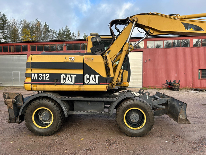 Caterpillar M312 Engcon EC20 tiltrotator - Ekskavator roda: gambar 5 Caterpillar M312 Engcon EC20 tiltrotator - Ekskavator roda: gambar 5