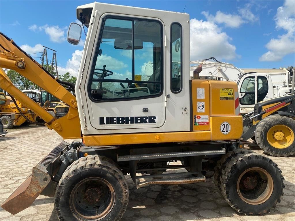 Ekskavator roda Liebherr A310B: gambar 7 Ekskavator roda Liebherr A310B: gambar 7
