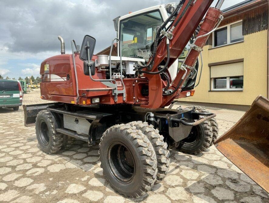 Liebherr A311 Litronic - Ekskavator roda: gambar 2 Liebherr A311 Litronic - Ekskavator roda: gambar 2