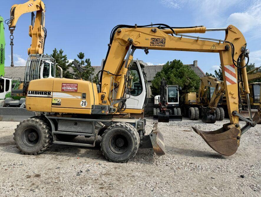 Liebherr A314 - Ekskavator roda: gambar 4 Liebherr A314 - Ekskavator roda: gambar 4