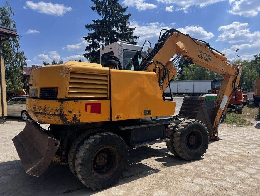 Liebherr A316 - Ekskavator roda: gambar 5 Liebherr A316 - Ekskavator roda: gambar 5