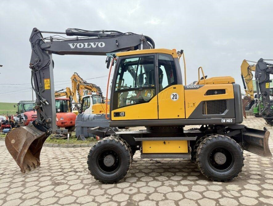 Volvo EW140D - Ekskavator roda: gambar 1 Volvo EW140D - Ekskavator roda: gambar 1