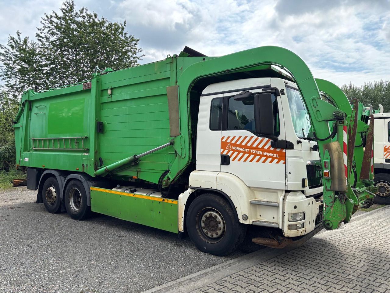 MAN TGS 26.320 EEV Heil Aufbau/Frontlader/Lift - Truk sampah: gambar 3 MAN TGS 26.320 EEV Heil Aufbau/Frontlader/Lift - Truk sampah: gambar 3
