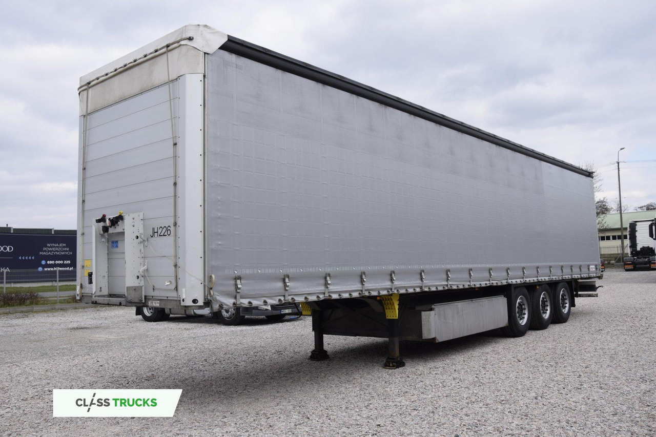 Schmitz Cargobull SCS24/L Lifting Axle - Semi-trailer dengan terpal samping: gambar 1 Schmitz Cargobull SCS24/L Lifting Axle - Semi-trailer dengan terpal samping: gambar 1