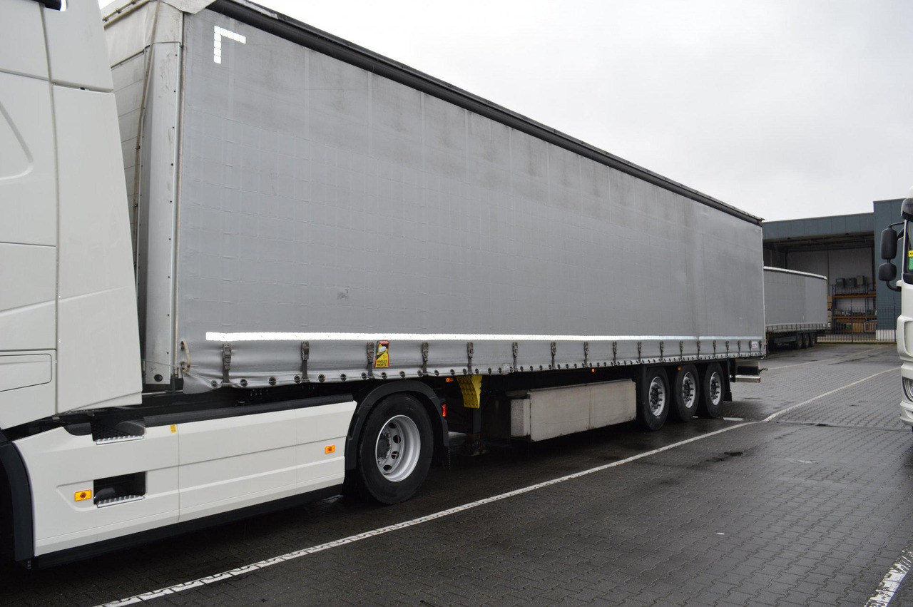 Schmitz Cargobull SCS24/L Lifting Axle - Semi-trailer dengan terpal samping: gambar 1 Schmitz Cargobull SCS24/L Lifting Axle - Semi-trailer dengan terpal samping: gambar 1