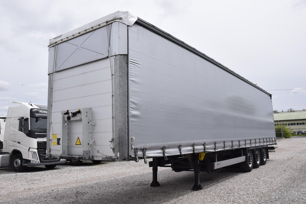 Schmitz Cargobull SCS24/L Varios - Semi-trailer dengan terpal samping: gambar 1 Schmitz Cargobull SCS24/L Varios - Semi-trailer dengan terpal samping: gambar 1