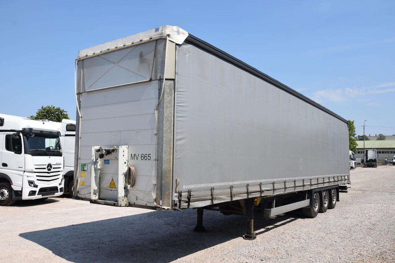 Schmitz Cargobull SCS24/L Varios - Semi-trailer dengan terpal samping: gambar 1 Schmitz Cargobull SCS24/L Varios - Semi-trailer dengan terpal samping: gambar 1