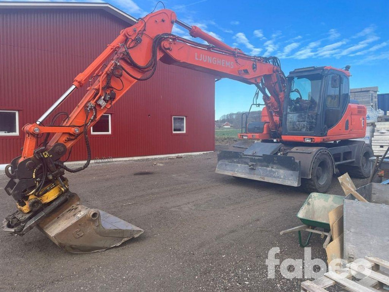 Doosan DX160W - Ekskavator roda: gambar 1 Doosan DX160W - Ekskavator roda: gambar 1