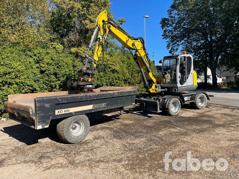 WACKER NEUSON EW100 - Ekskavator roda: gambar 1 WACKER NEUSON EW100 - Ekskavator roda: gambar 1